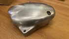 Triumph Thruxton 900 / Bonneville Sprocket Cover T1262000 Used. Price: $38.40.